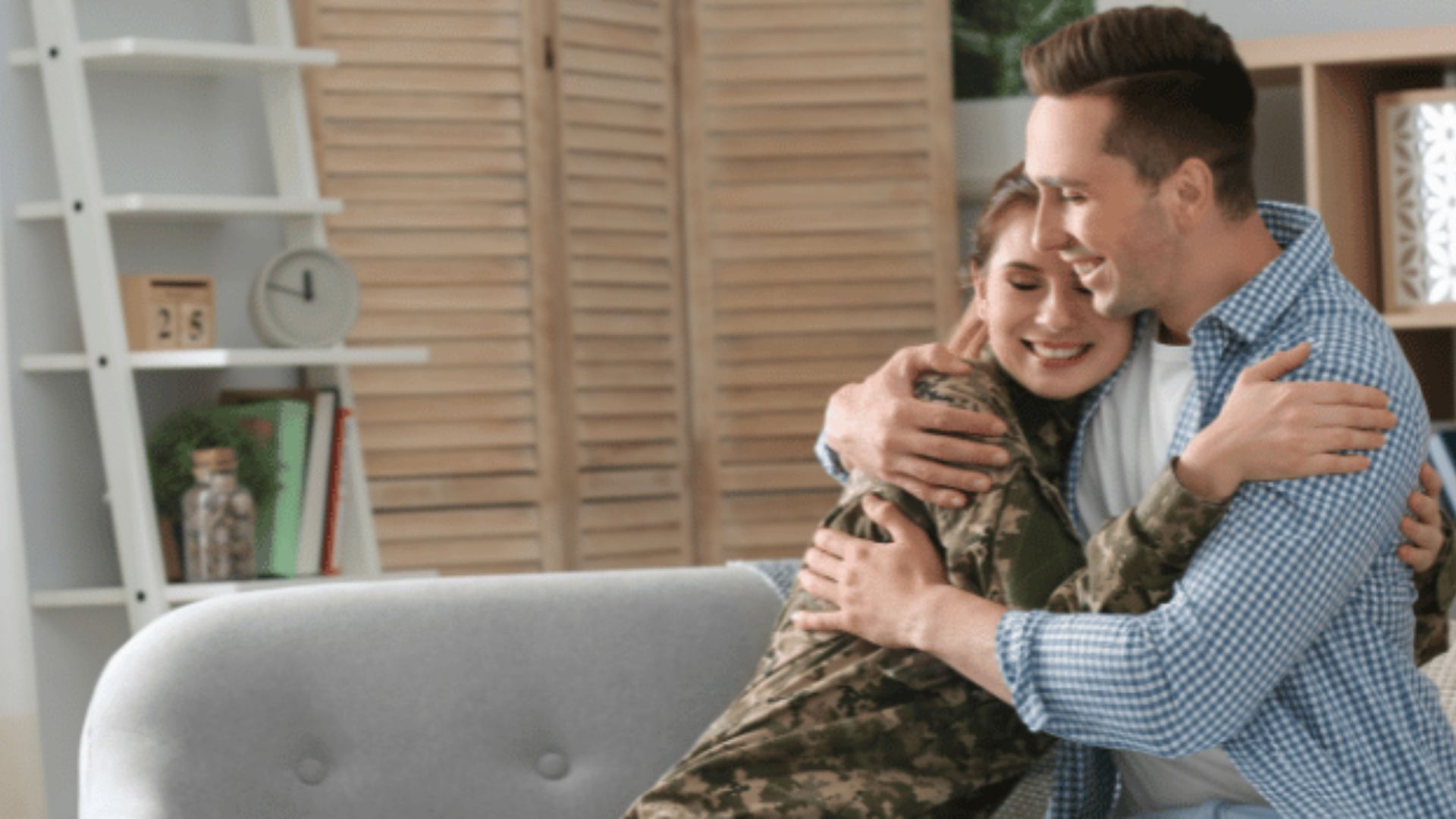 couple with military woman giving each other a hug after spending some time without seeing you